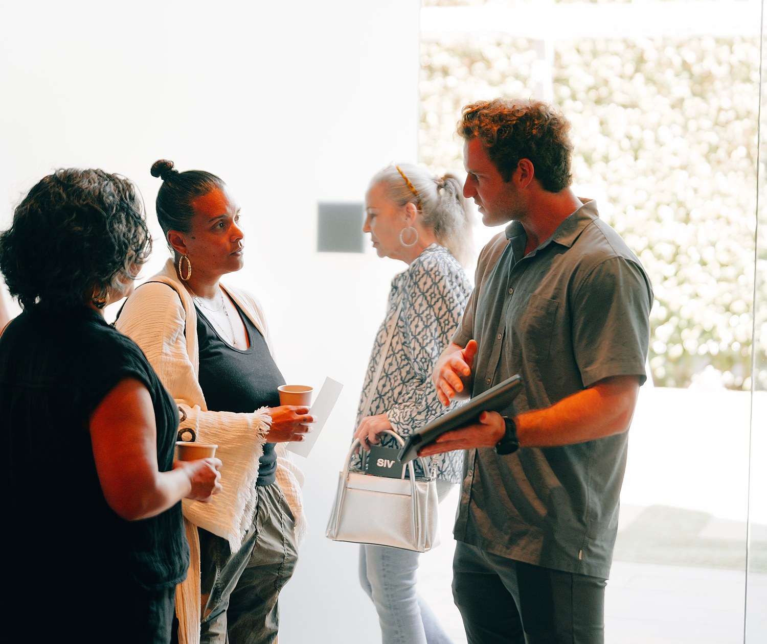 Members talking with a Citrin Longevity team member at the West Hollywood longevity clinic in Los Angeles