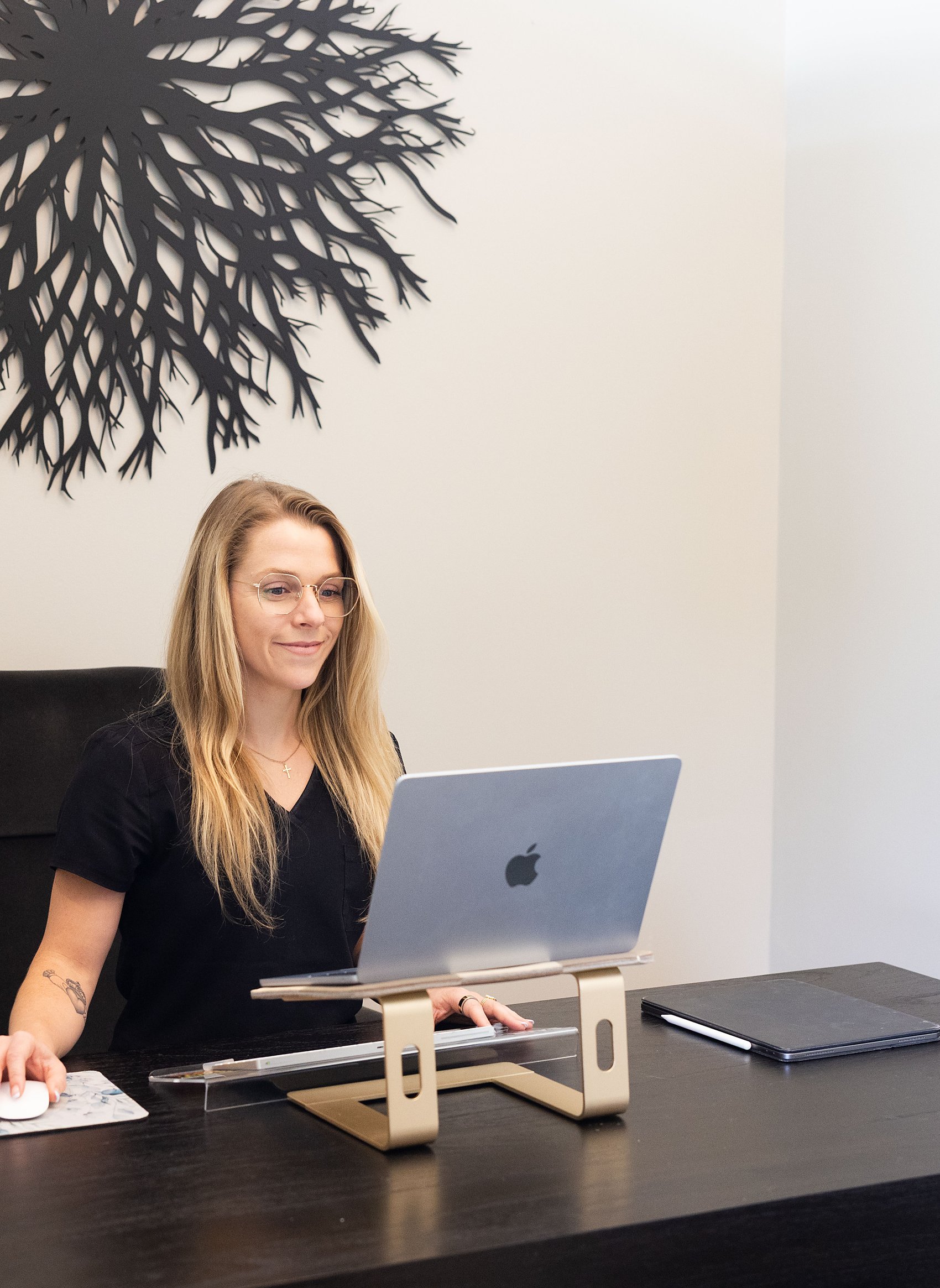 Dr. Haley Moran reviewing member labs at her desk, the quarterly clinical oversight in the Essentials membership at Citrin Longevity in West Hollywood
