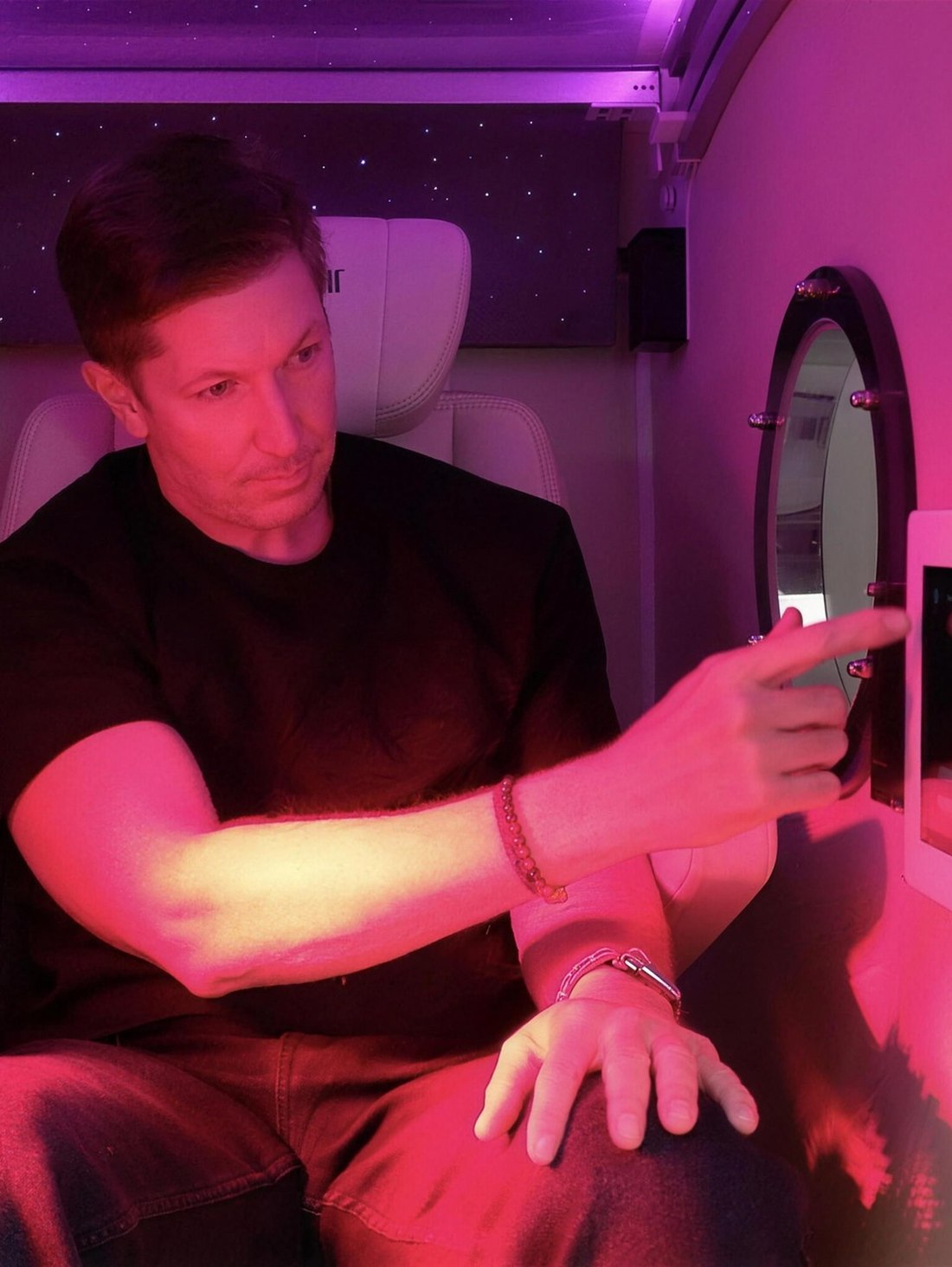 Red light inside the hyperbaric chamber at Citrin Longevity in West Hollywood, Los Angeles