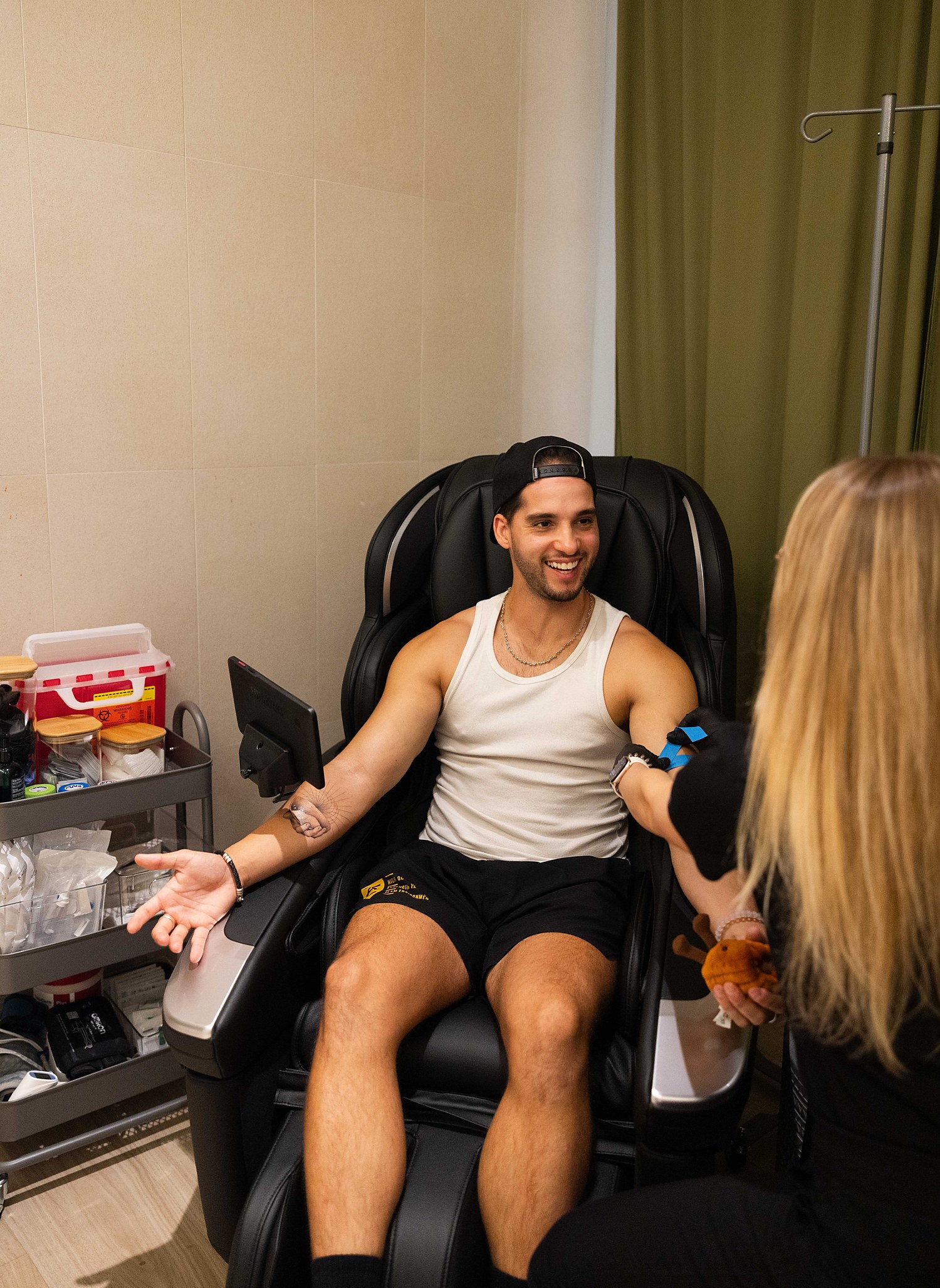 A member receiving a doctor-supervised IV infusion in the treatment chair at Citrin Longevity in West Hollywood, Los Angeles