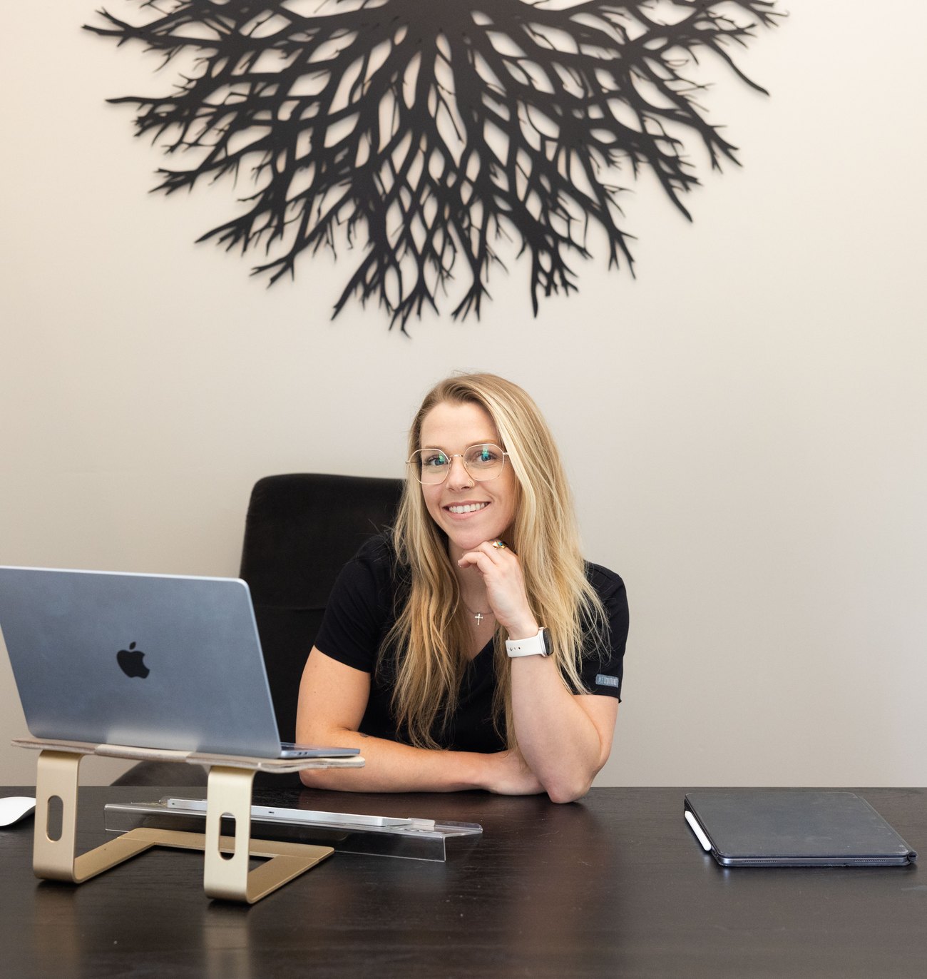 Dr. Haley Moran, ND, at her desk at Citrin Longevity in West Hollywood
