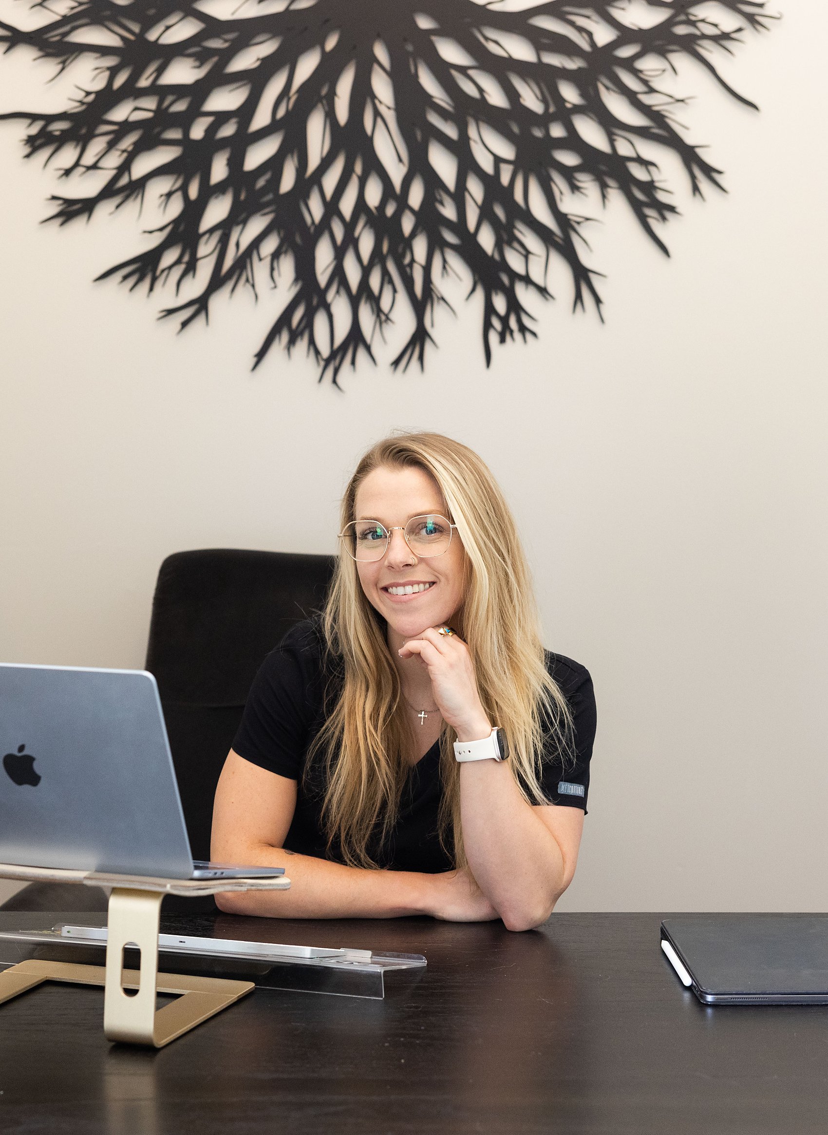 Dr. Haley Moran at her desk reviewing member results, the quarterly clinical oversight in the Restore membership at Citrin Longevity in West Hollywood